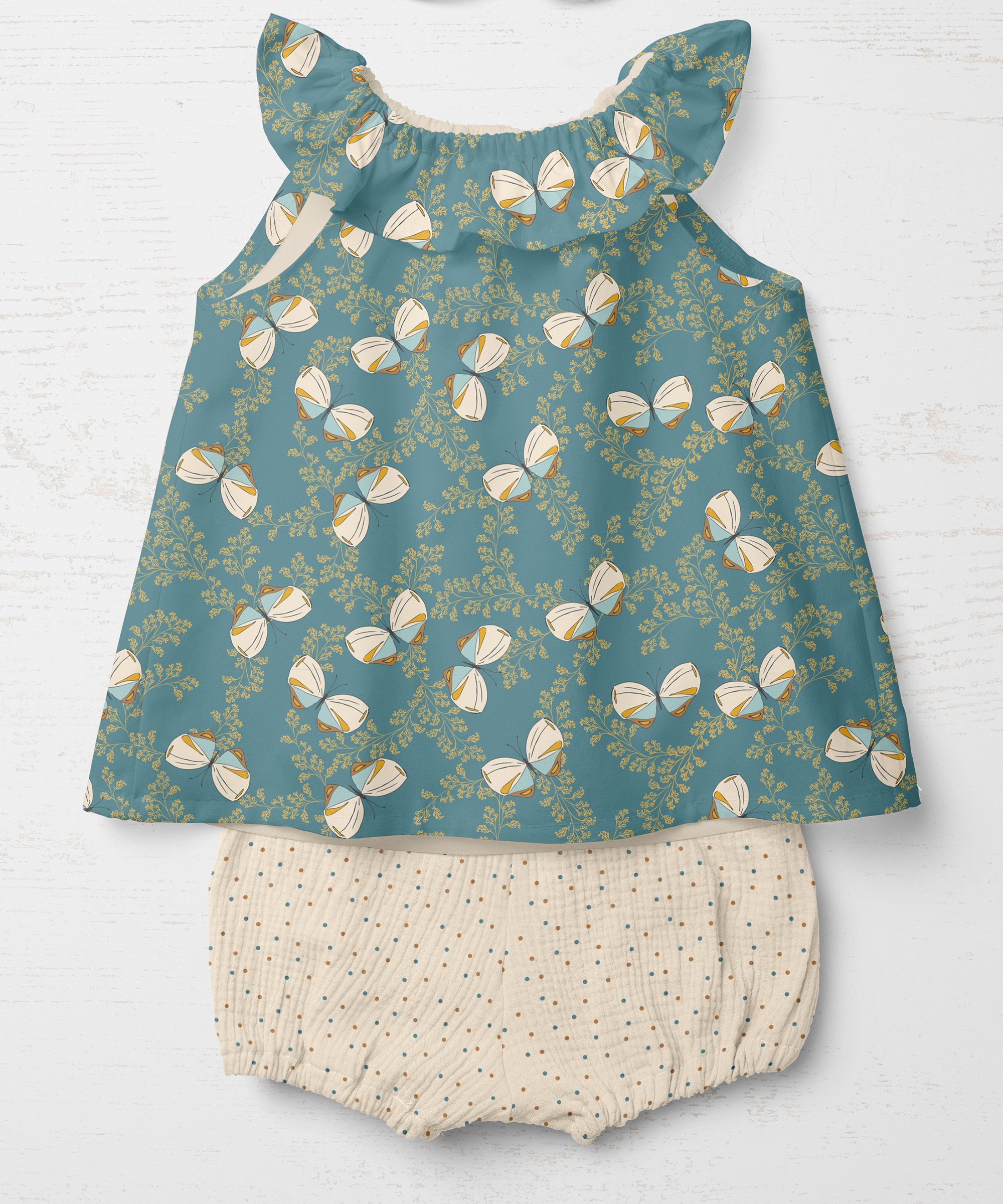 Baby top and shorts with butterflies pattern in teal