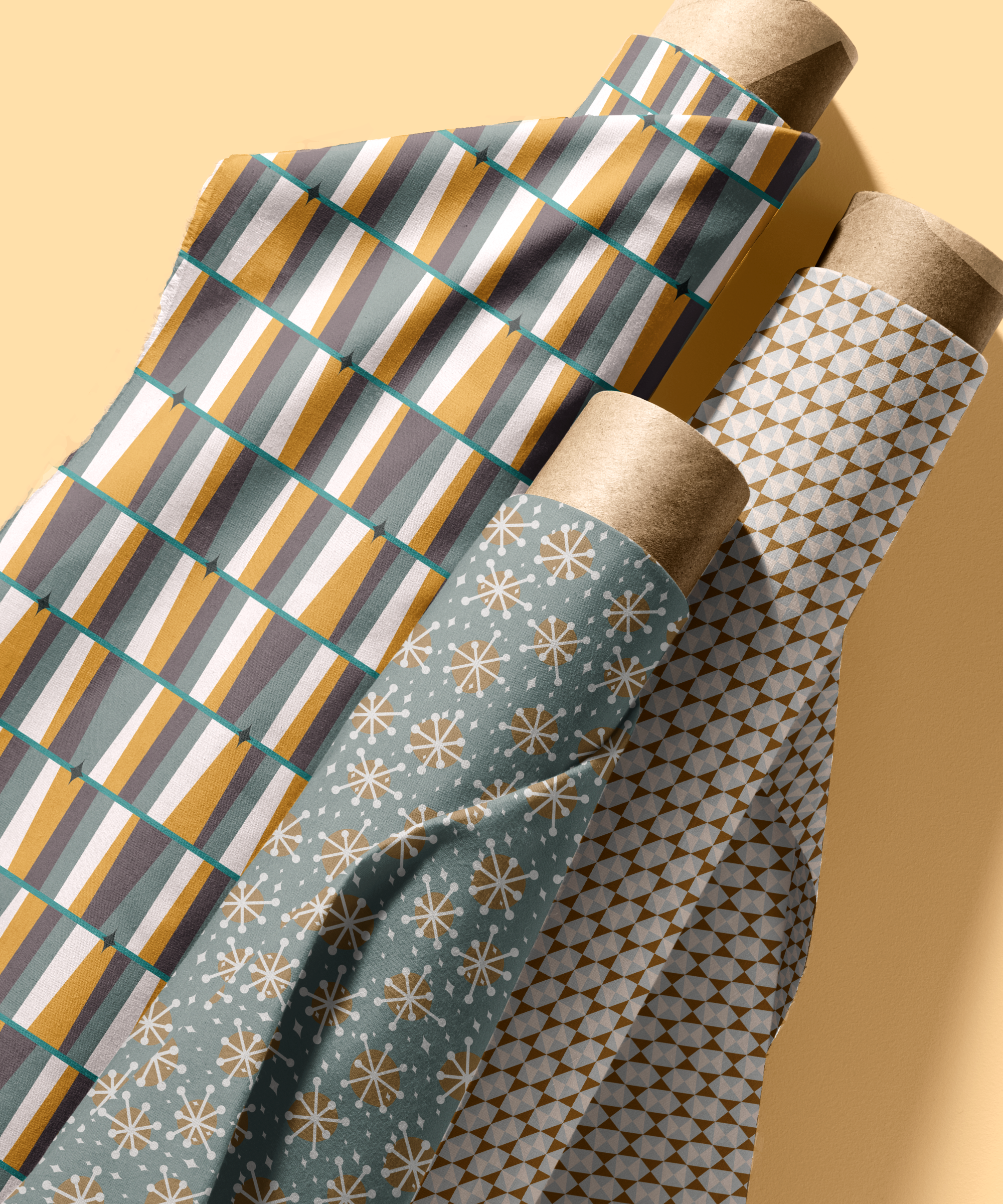 Christmas fabric rolls in greens and yellows